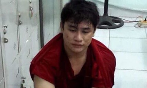 Nghi can Nguyễn Tấn Tài (Tài mụn) tại cơ quan công an.